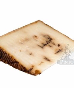 Queso Pinto de oveja Gran Reserva de ajo negro .